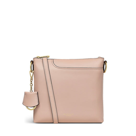 POCKETS 2.0
Small Zip-Top Cross Body