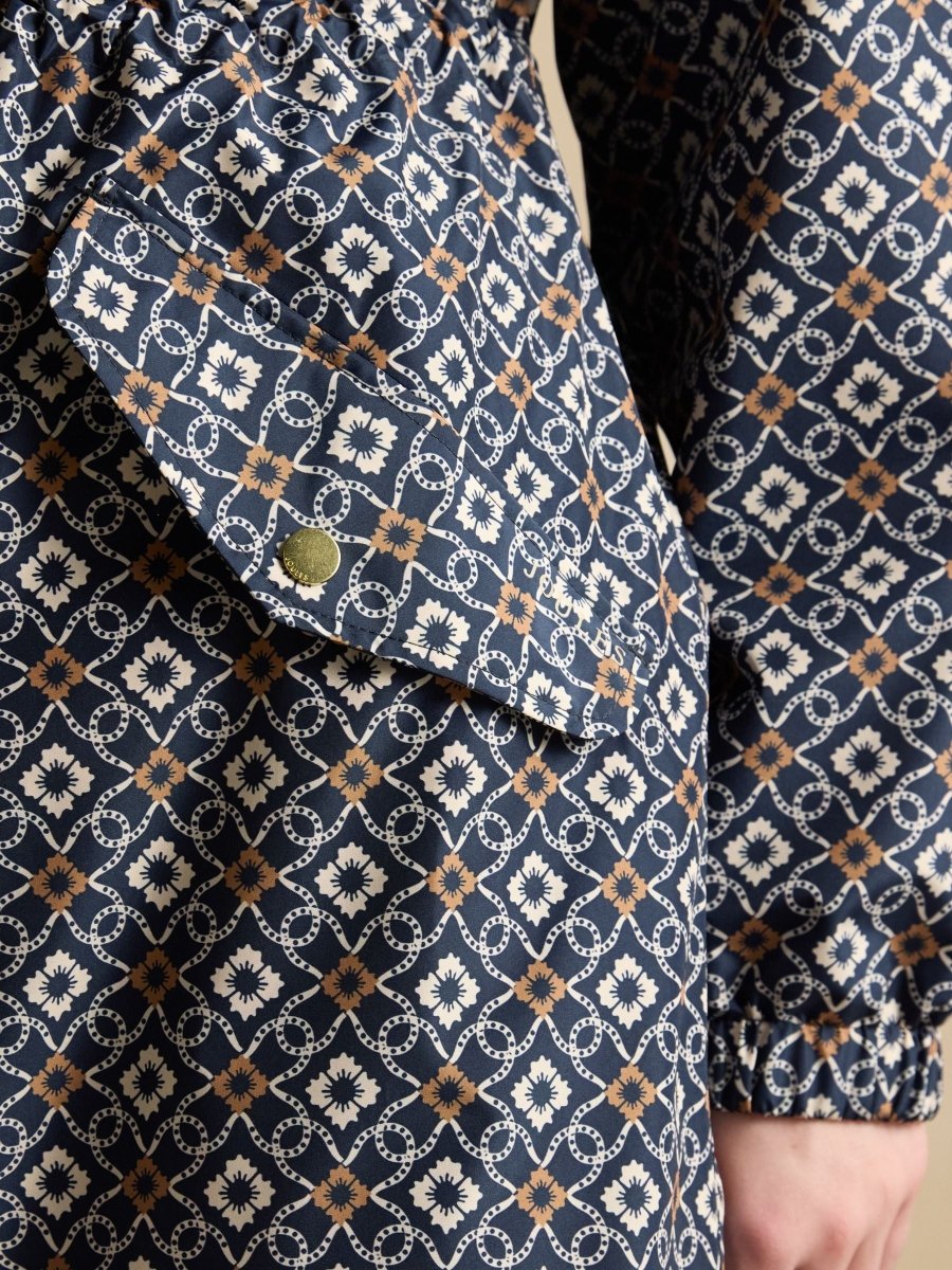 Holkham Navy Floral Waterproof Packable Raincoat With Hood - RUTHERFORD & Co