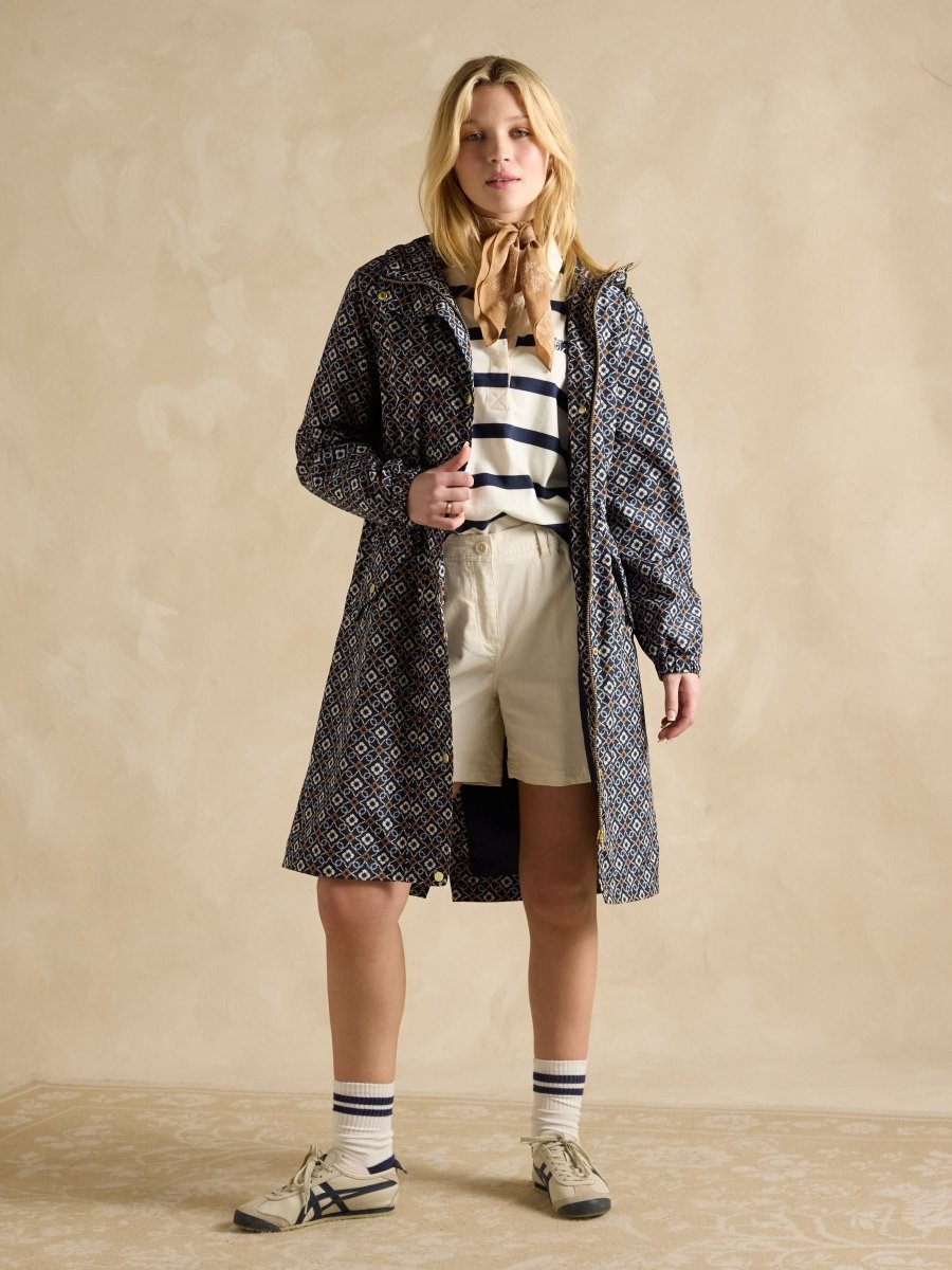 Holkham Navy Floral Waterproof Packable Raincoat With Hood - RUTHERFORD & Co