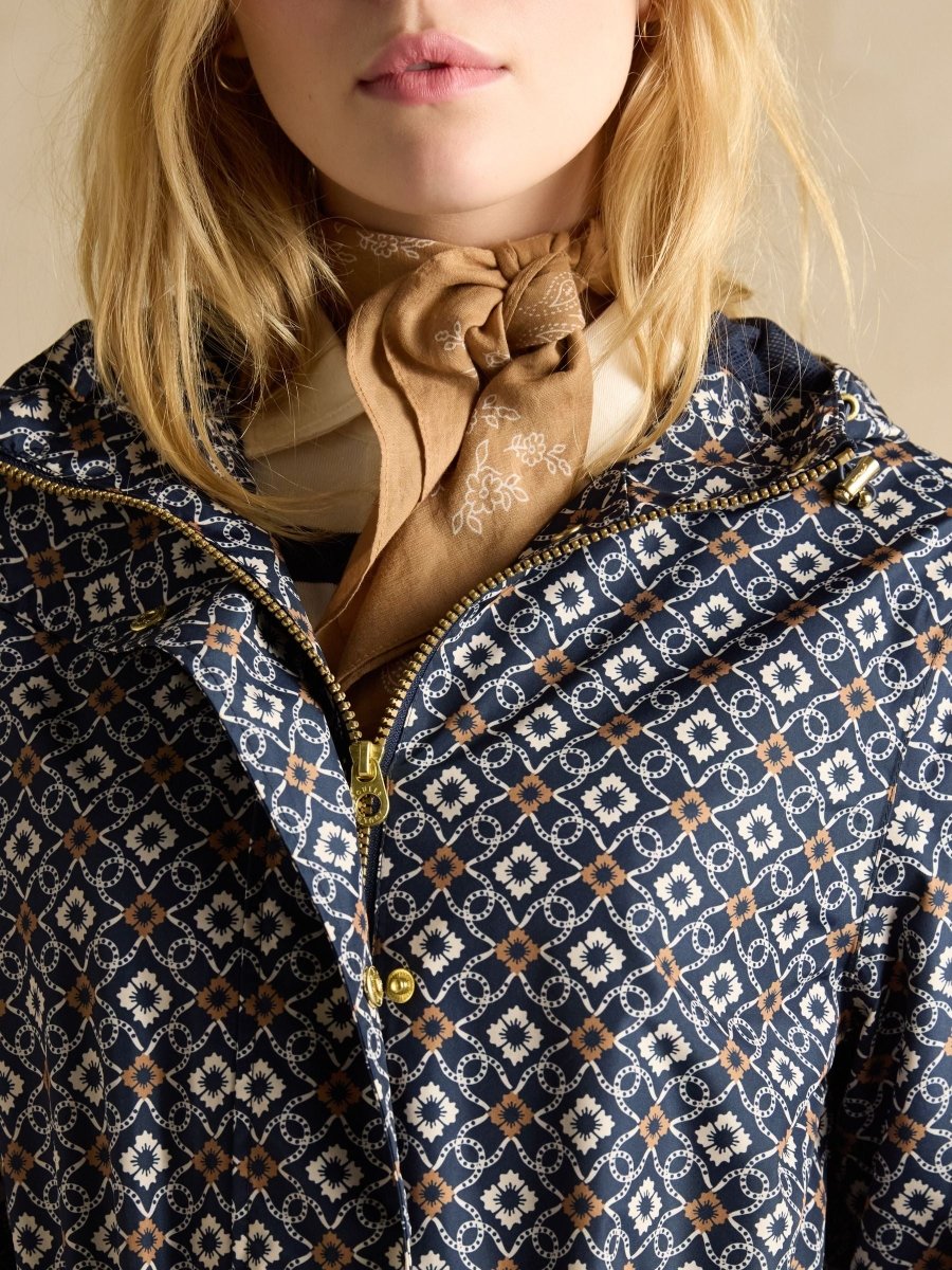 Holkham Navy Floral Waterproof Packable Raincoat With Hood - RUTHERFORD & Co