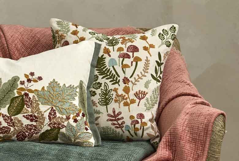 Embroidered forest glade cushion