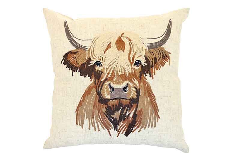 Embroidered highland cow cushion
