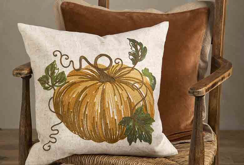 Embroidered pumpkin cushion