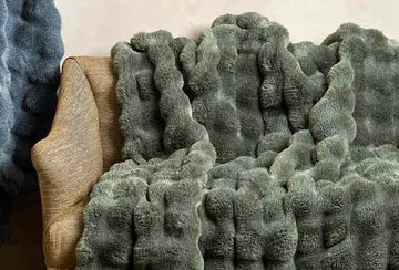 Feather faux fur throw eucalyptus