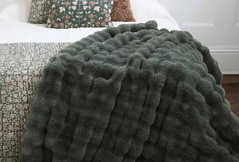 Feather faux fur throw eucalyptus