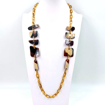 Flat rounded square resin shapes on long resin chain necklace