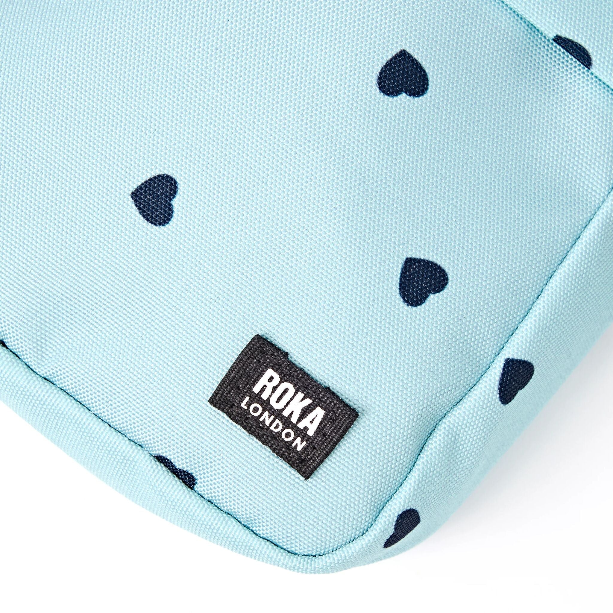 Bond Pocket Crossbody Bag in Heart Print