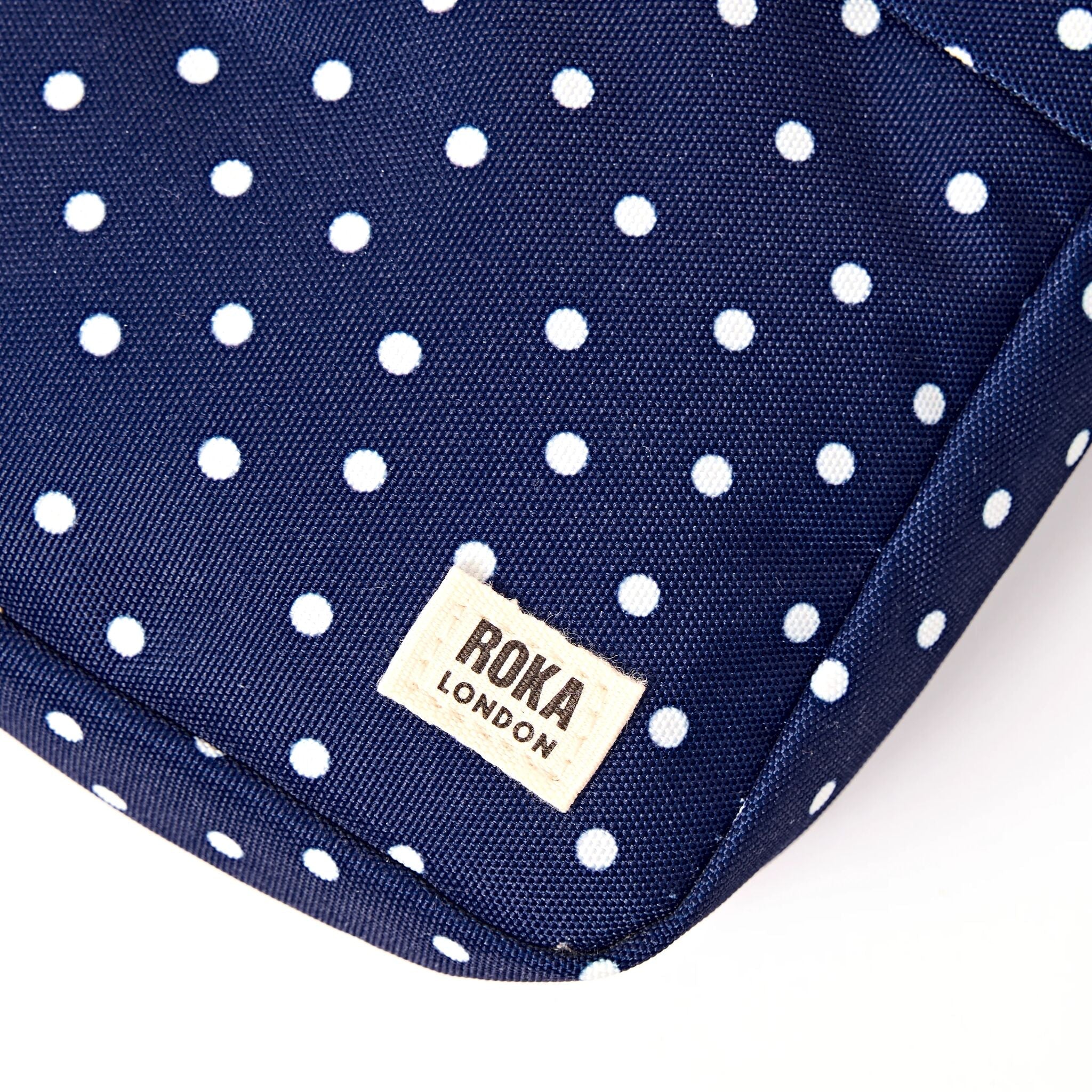 Bond Pocket Crossbody Bag in Navy Polka Dot