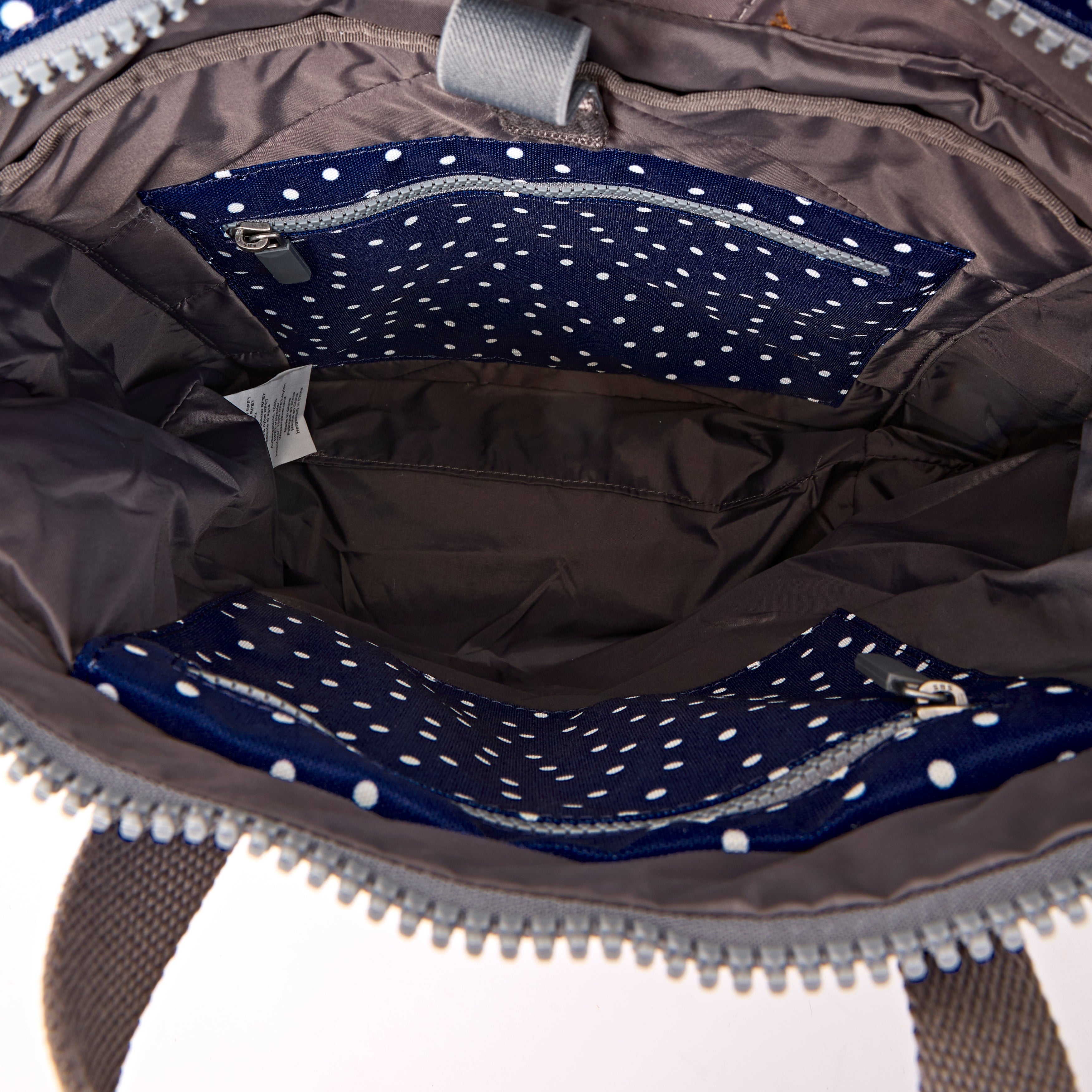 Canfield Roll Top Backpack in Navy Polka Dot