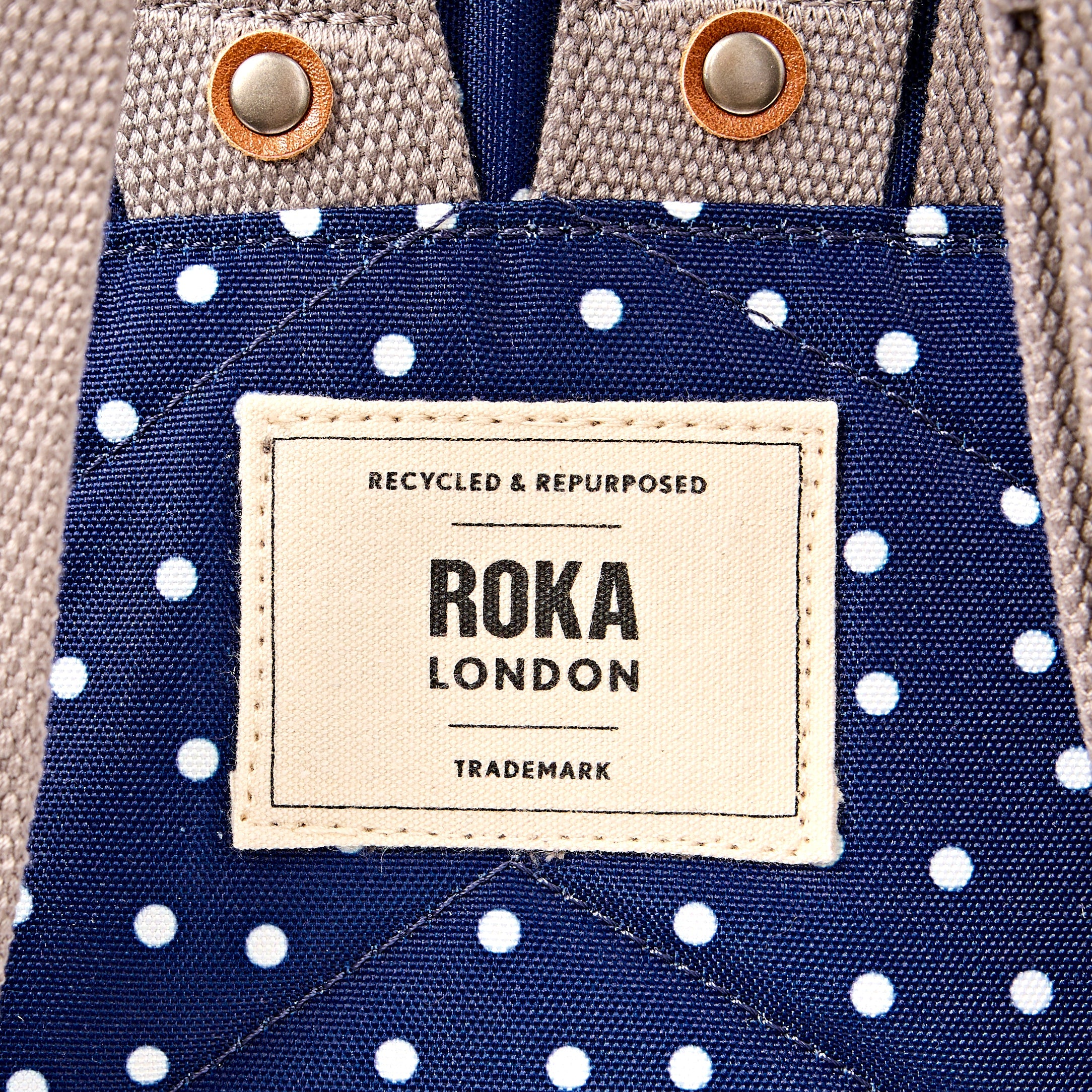 Canfield Roll Top Backpack in Navy Polka Dot