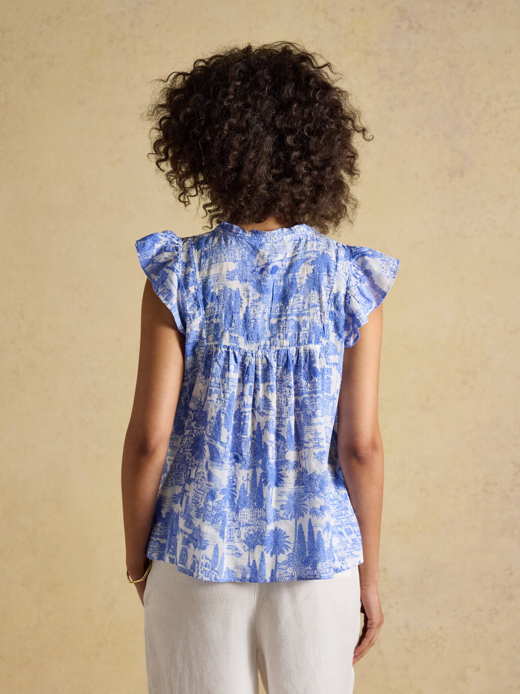 Nolan Blue Toile Sleeveless Tie Neck Blouse
