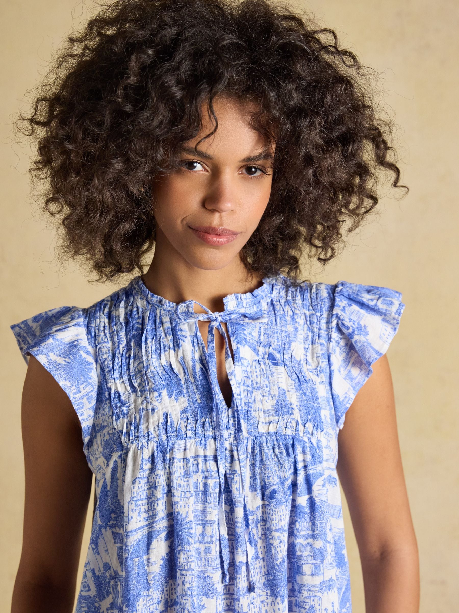 Nolan Blue Toile Sleeveless Tie Neck Blouse