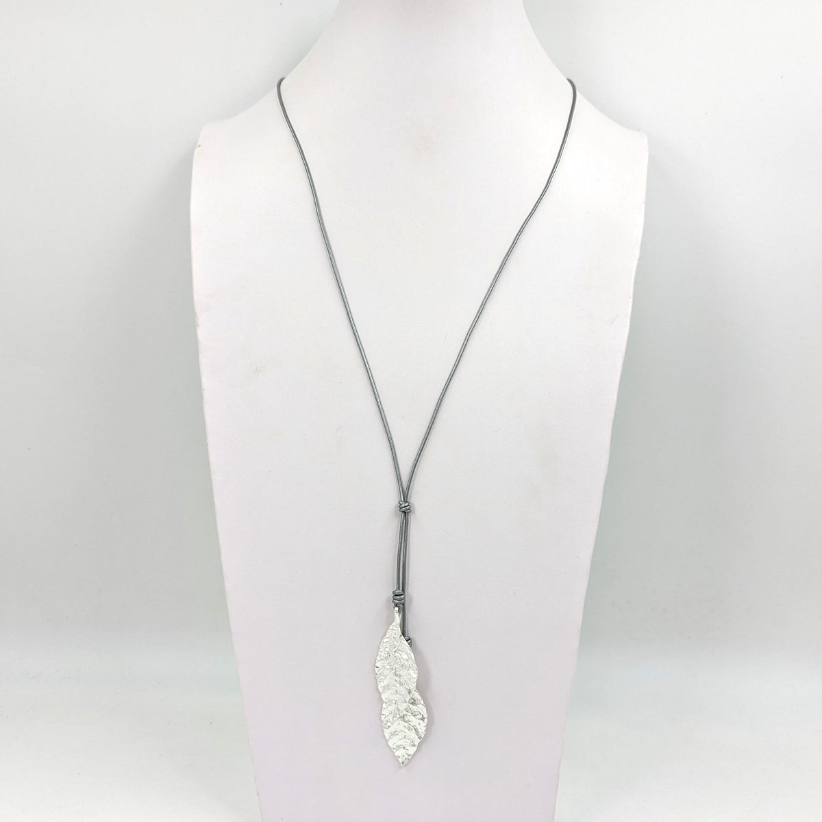 Long lariat-style leaf impression leather necklace