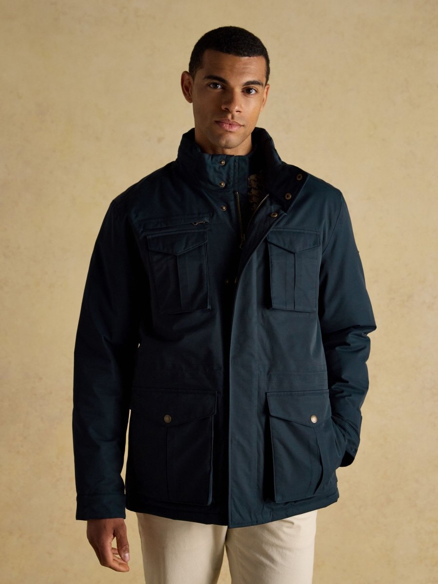 Beckett Navy Waterproof Field Coat With Packable Hood - RUTHERFORD & Co