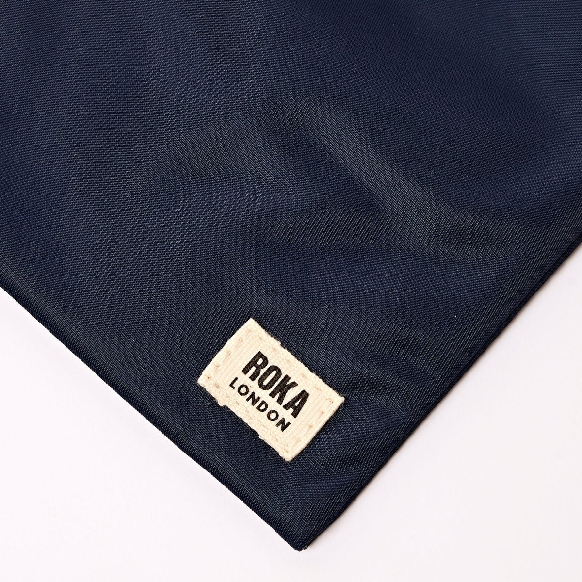 Chelsea Pocket Sling Bag in Midnight Stripe - RUTHERFORD & Co