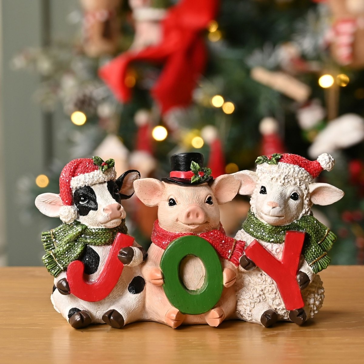 Christmas Cow, Pig & Sheep Figurine Holding Joy - RUTHERFORD & Co