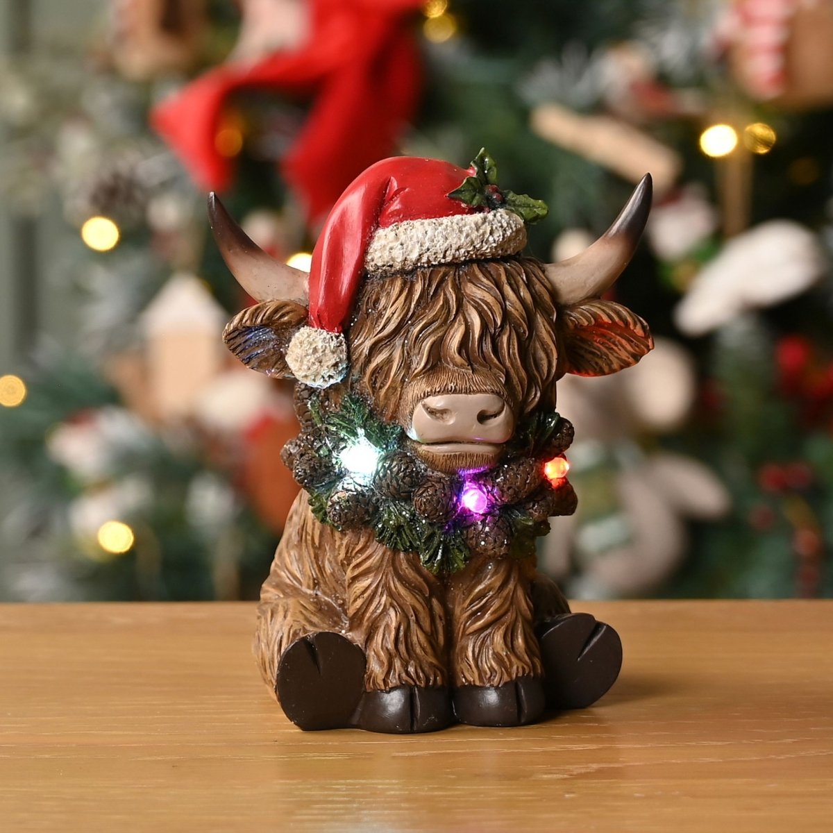 Christmas Highland Cow with LED Lights 14cm - RUTHERFORD & Co