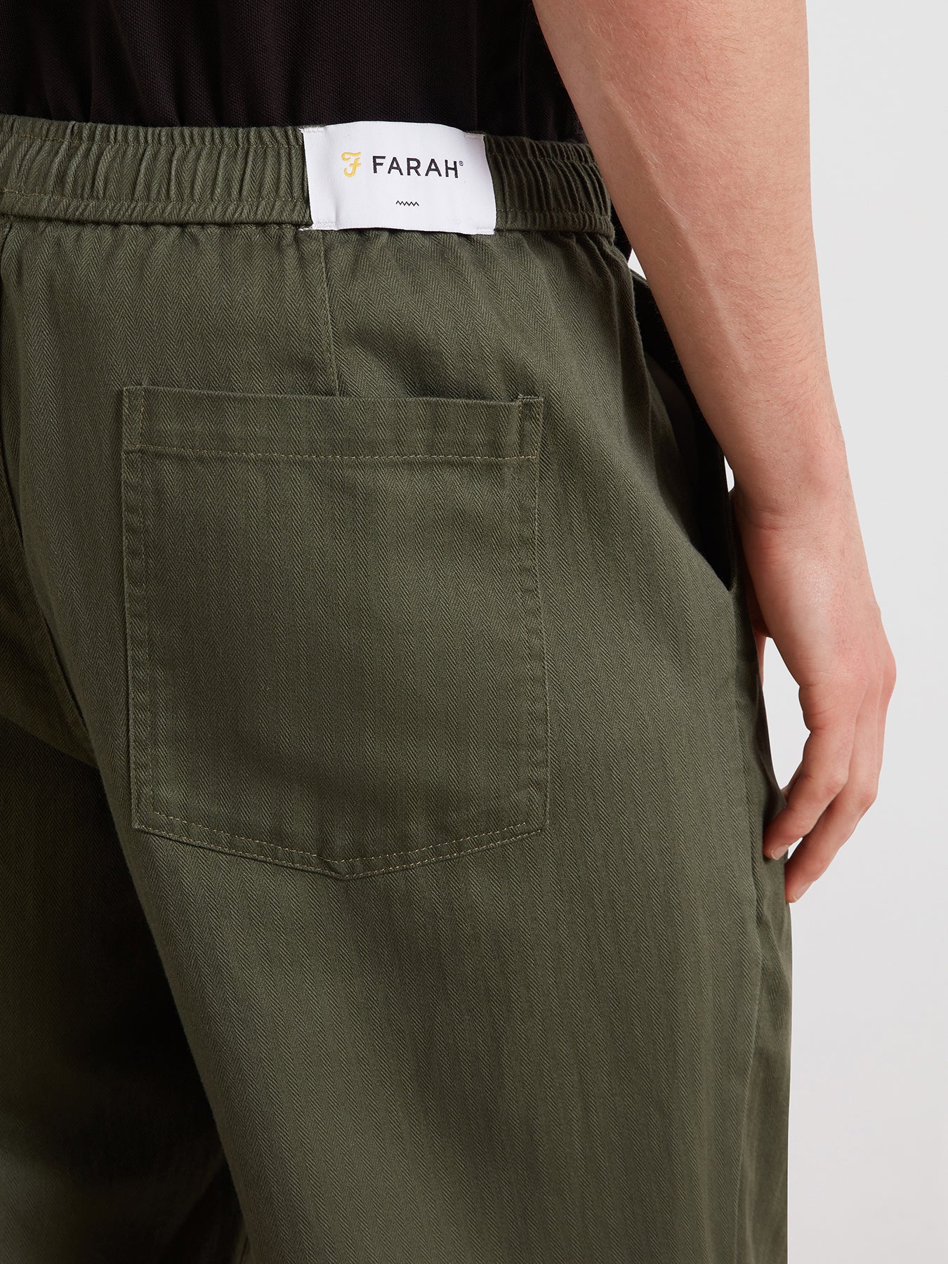 Greenport Loose Fit Herringbone Trousers In Rosemary