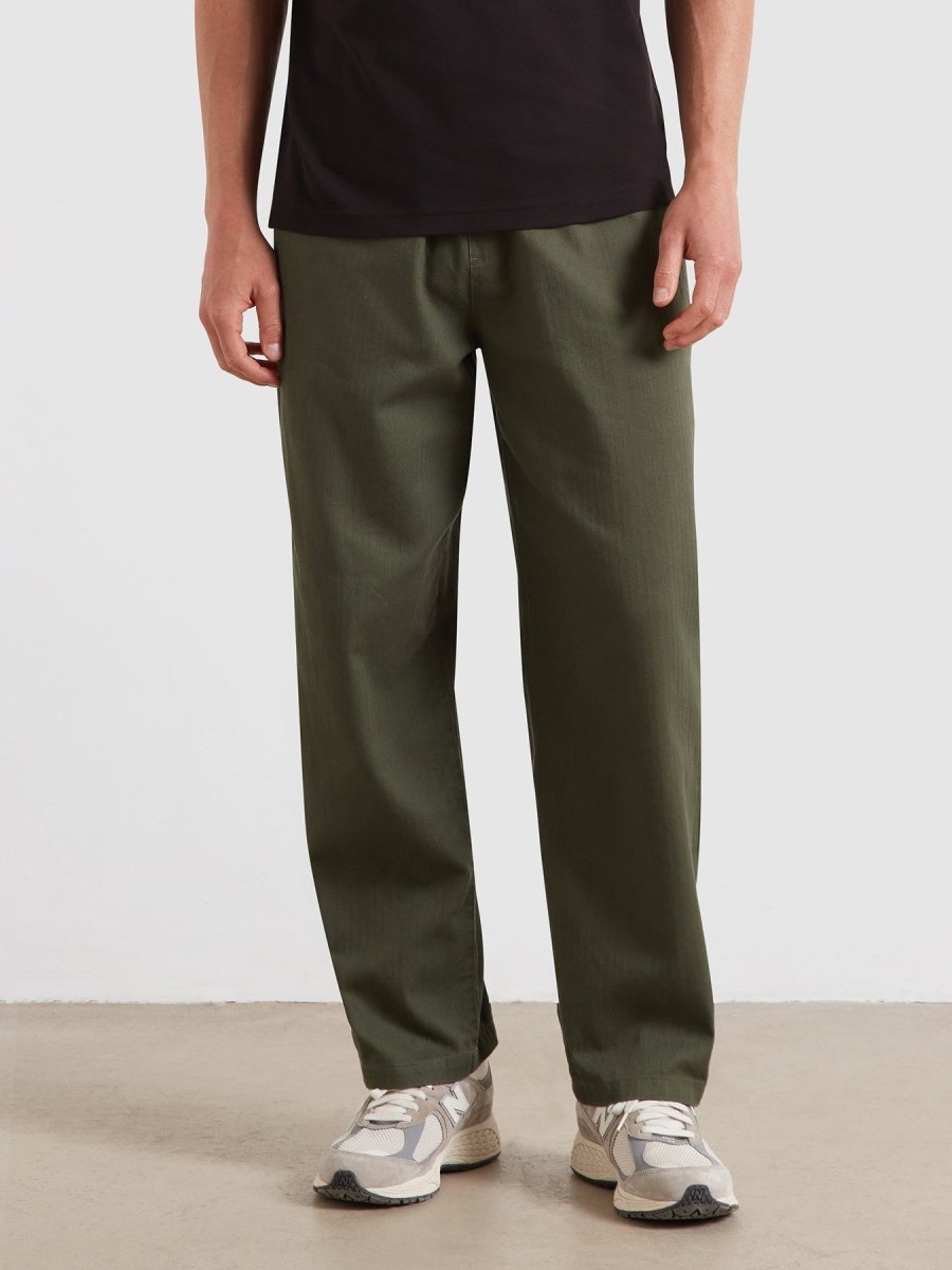 Greenport Loose Fit Herringbone Trousers In Rosemary - RUTHERFORD & Co
