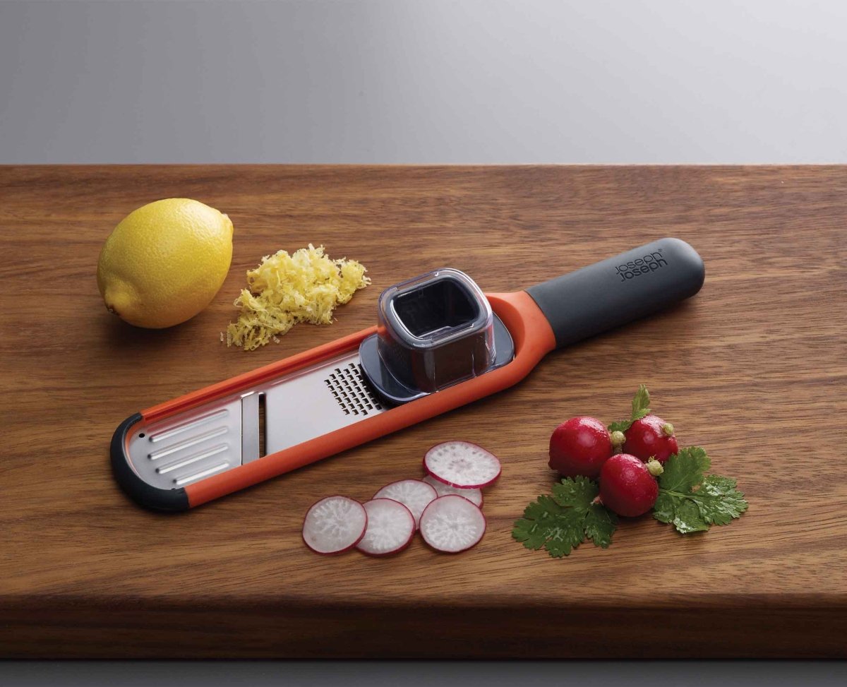 Handi - Grate™ Orange 2 - in - 1 Mini Grater & Slicer - RUTHERFORD & Co