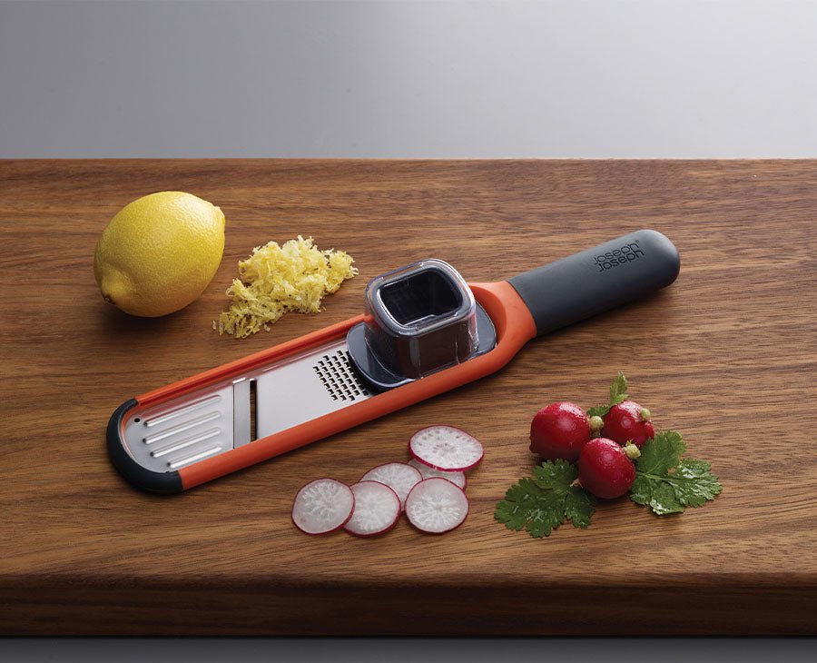 Handi - Grate™ Orange 2 - in - 1 Mini Grater & Slicer - RUTHERFORD & Co