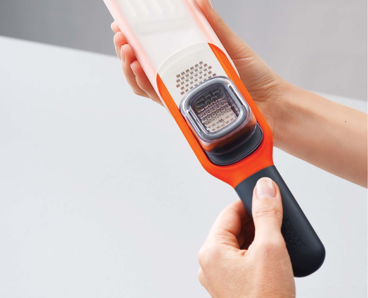 Handi - Grate™ Orange 2 - in - 1 Mini Grater & Slicer - RUTHERFORD & Co