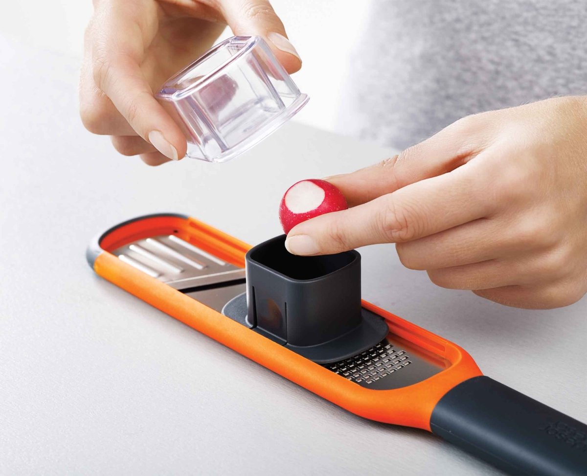 Handi - Grate™ Orange 2 - in - 1 Mini Grater & Slicer - RUTHERFORD & Co