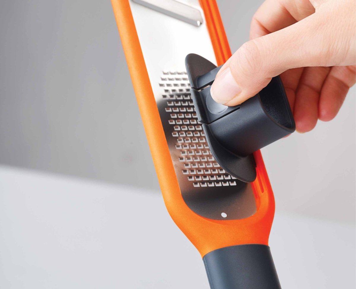Handi - Grate™ Orange 2 - in - 1 Mini Grater & Slicer - RUTHERFORD & Co
