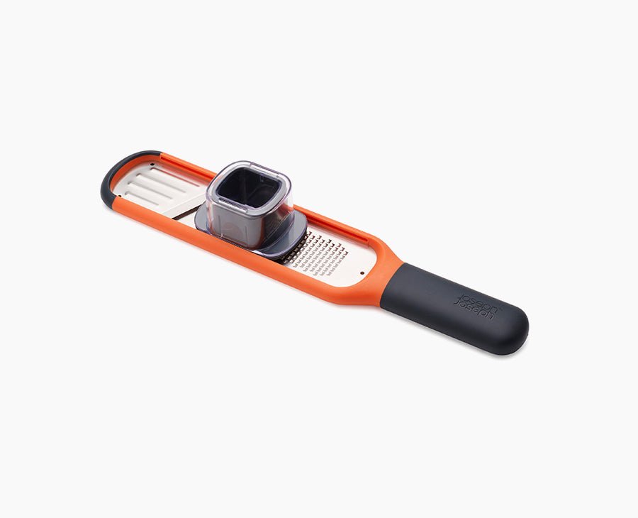 Handi - Grate™ Orange 2 - in - 1 Mini Grater & Slicer - RUTHERFORD & Co