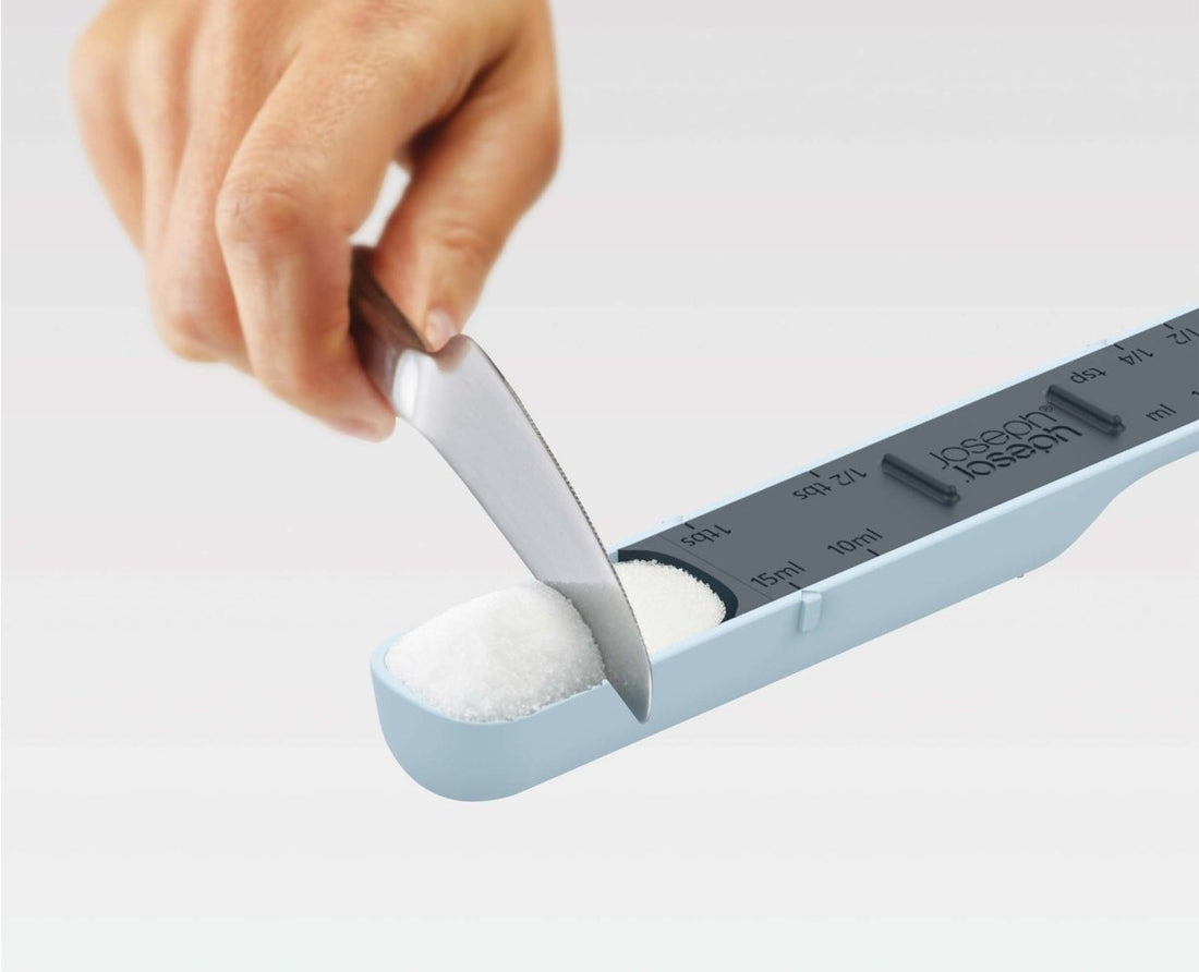 Measure - Up™ Blue Adjustable Measuring Spoon - RUTHERFORD & Co