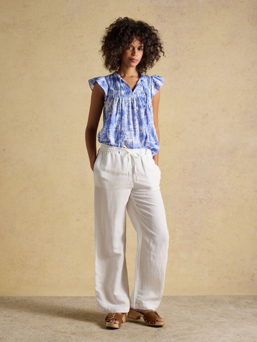 Nolan Blue Toile Sleeveless Tie Neck Blouse - RUTHERFORD & Co