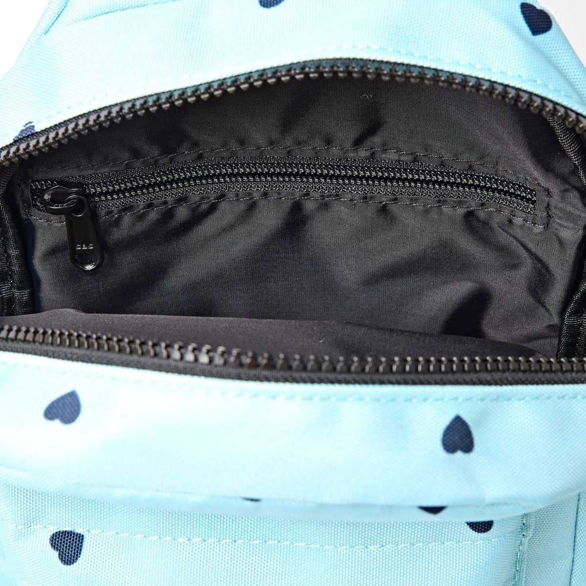 Willesden Sling Bag in Heart Print - RUTHERFORD & Co