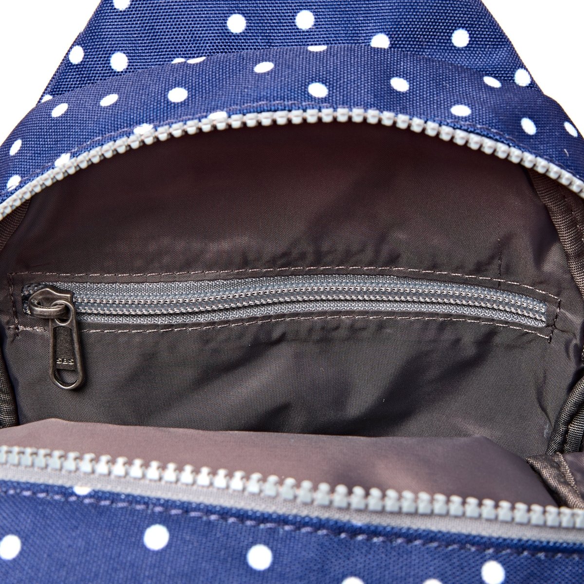 Willesden Sling Bag in Navy Polka Dot - RUTHERFORD & Co