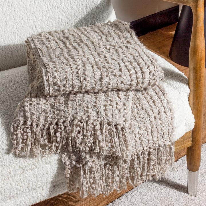 Arvo Woven Tasselled Throw Feather - RUTHERFORD & Co
