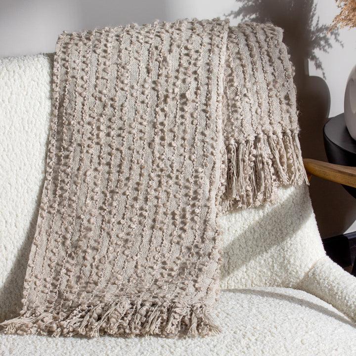 Arvo Woven Tasselled Throw Feather - RUTHERFORD & Co